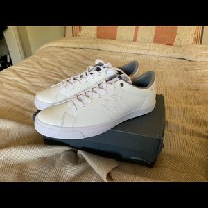 Brand new New Balance white sneakers